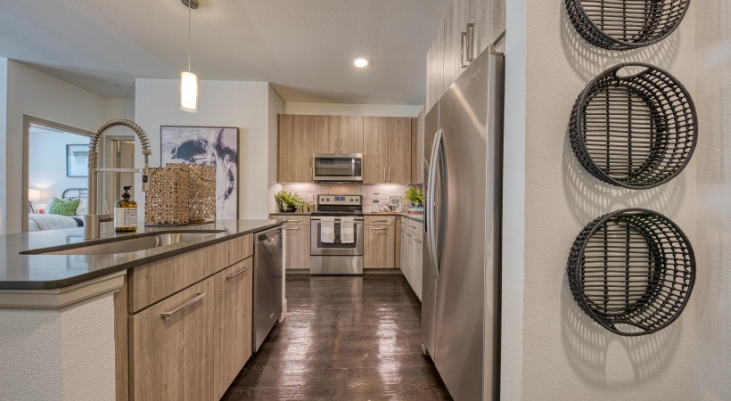 Settle into comfort at Berkshire at the Rim a kitchen with a stainless steel refrigerator