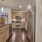 a kitchen with a stainless steel refrigerator
