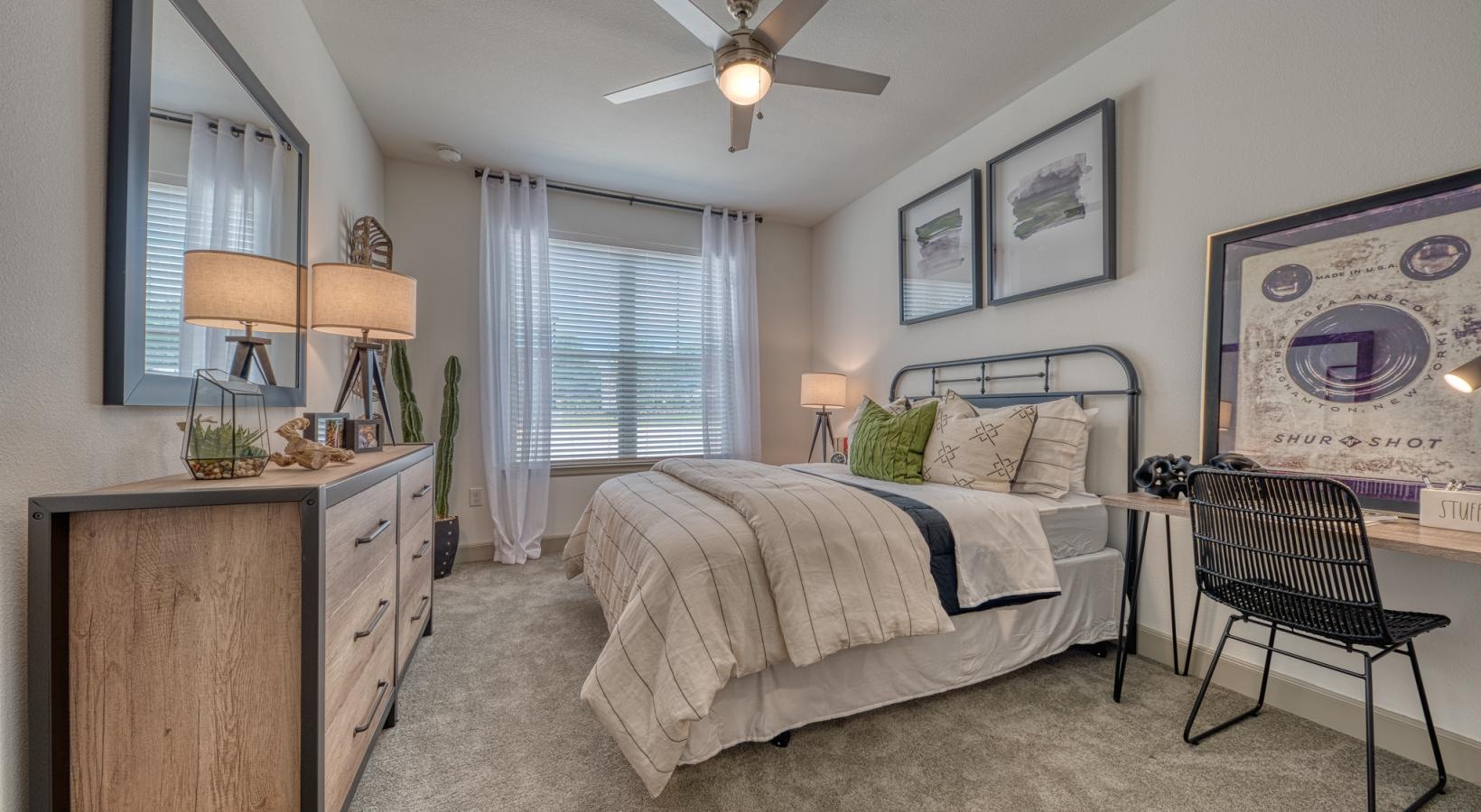 Sleep in style a bedroom with a bed and a chair