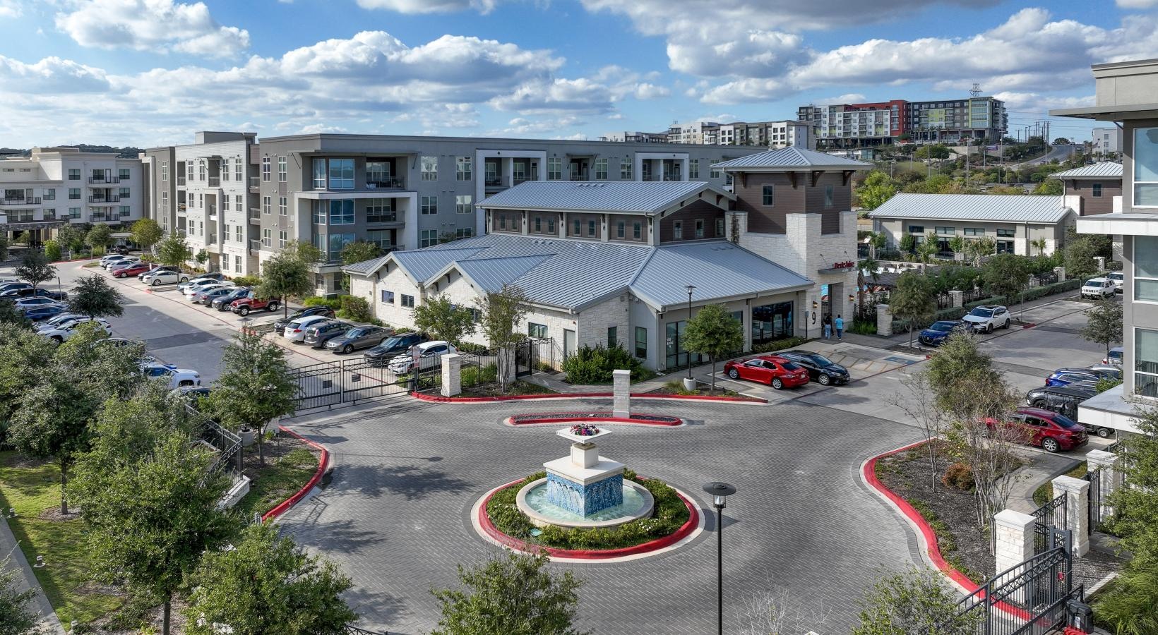 Settle into comfort at Berkshire at the Rim a group of buildings with cars parked in front of them
