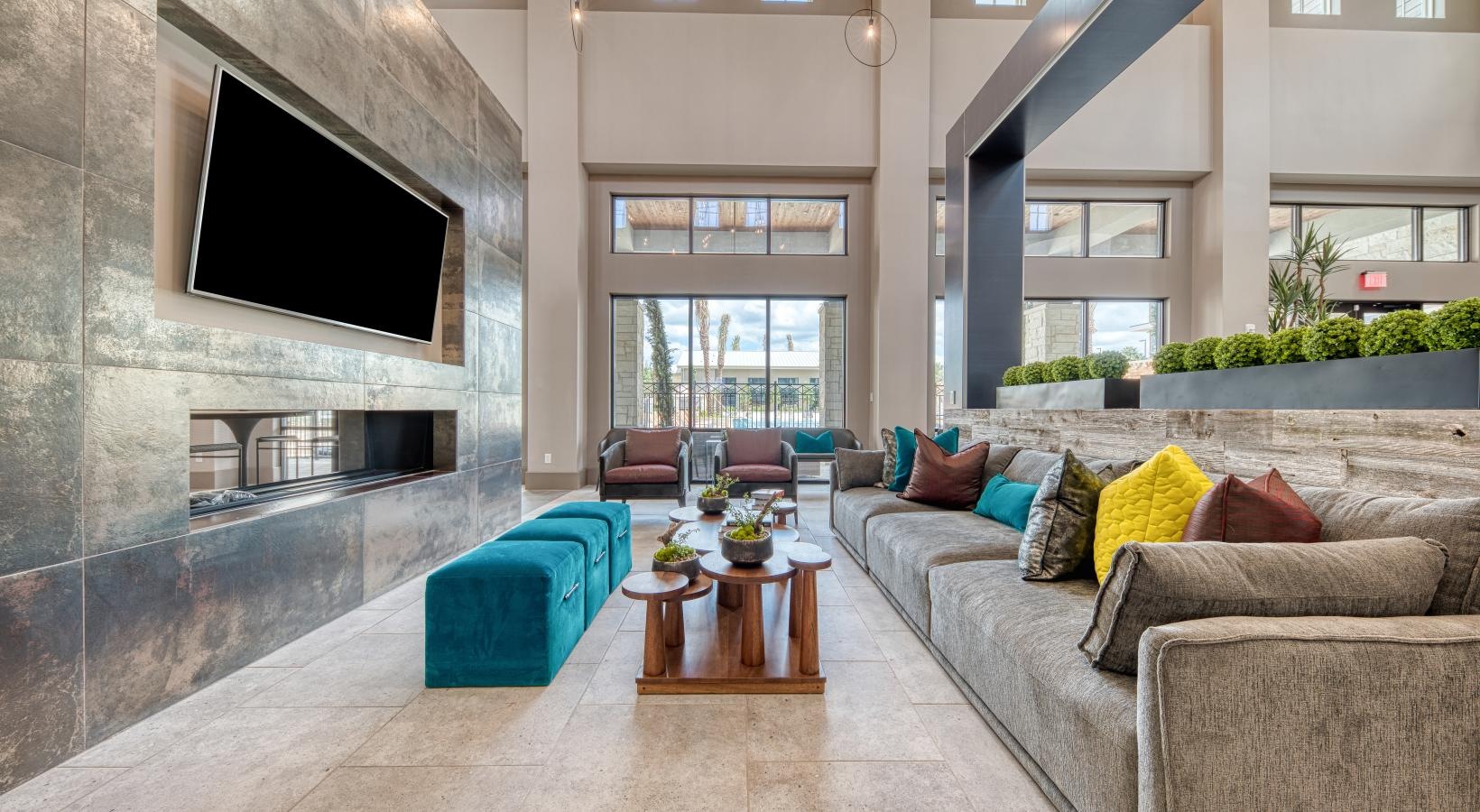 Access to resident-only features a living room with a fireplace