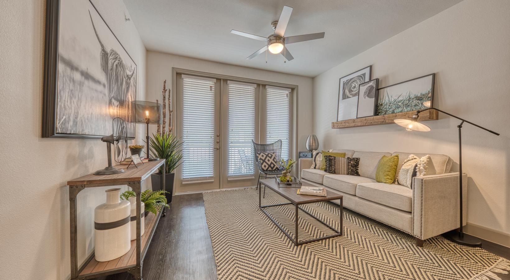Wide open living areas perfect for entertaining a living room with a couch and a table