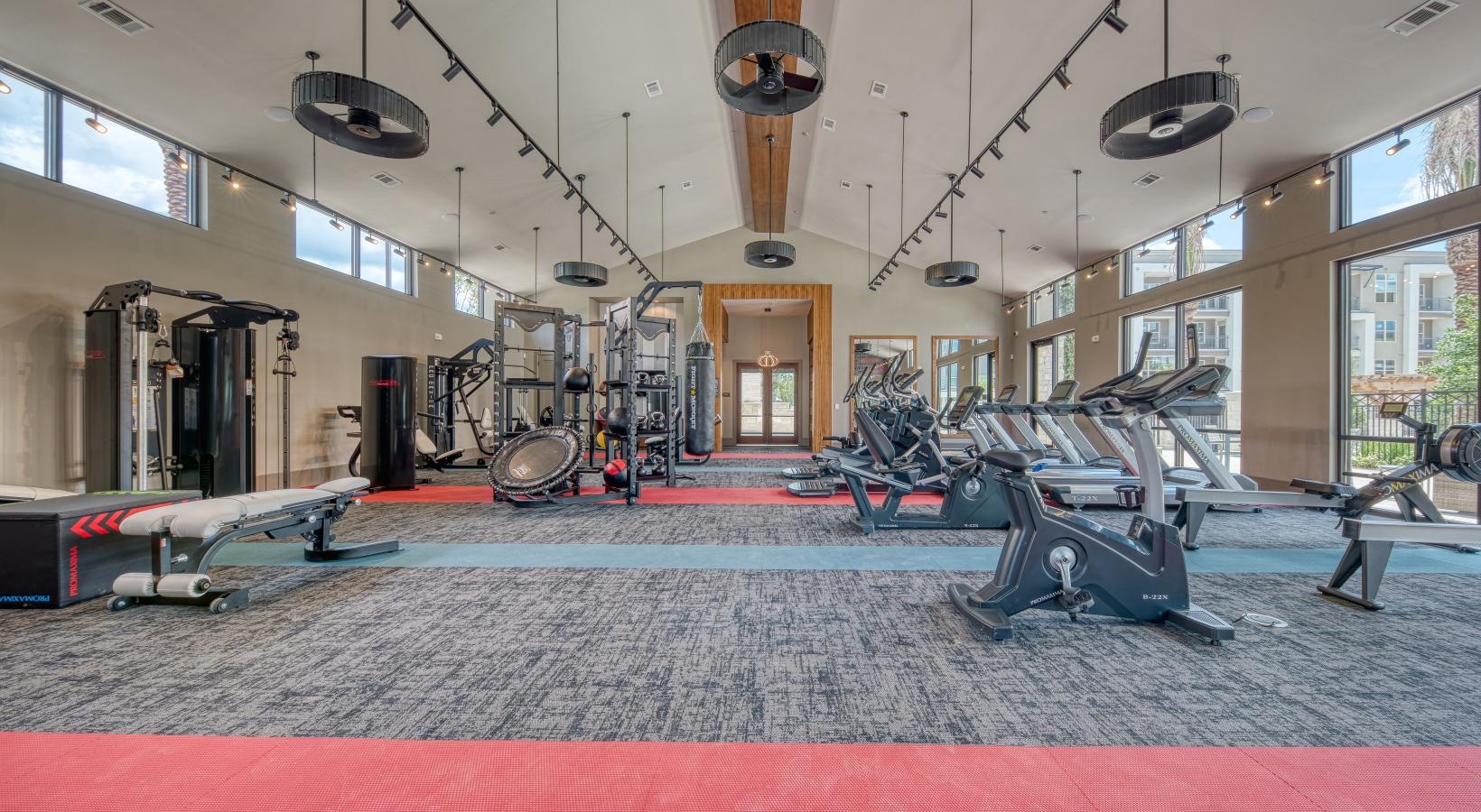 Cutting-edge amenities at your fingertips a gym with exercise equipment