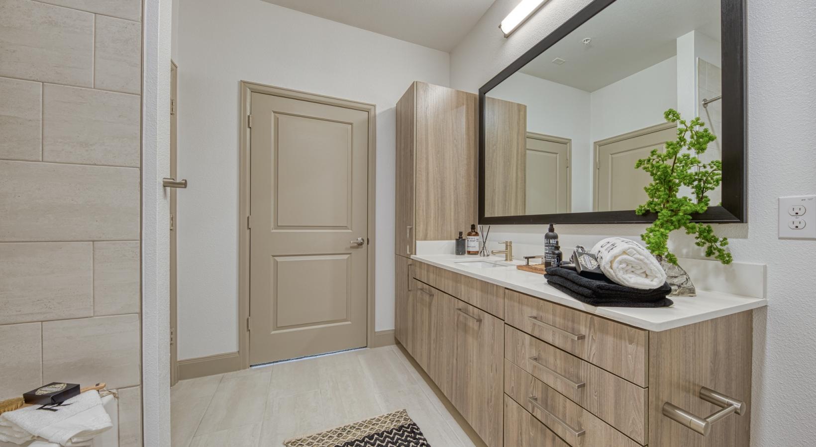 Spacious bathrooms with everything you need a bathroom with a large mirror