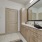 a bathroom with a large mirror