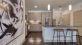 a kitchen with a large map