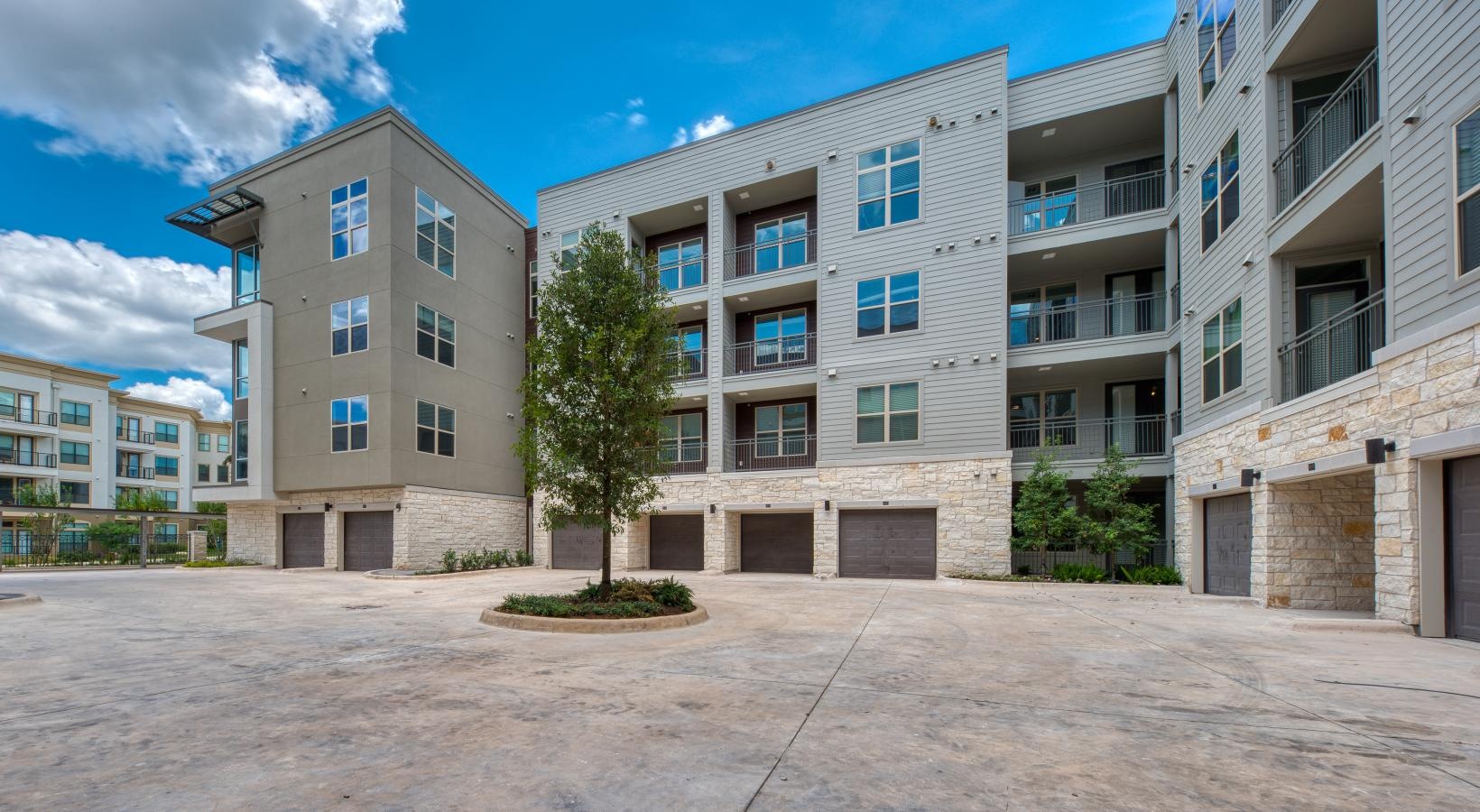 Settle into comfort at Berkshire at the Rim a building with a tree in front