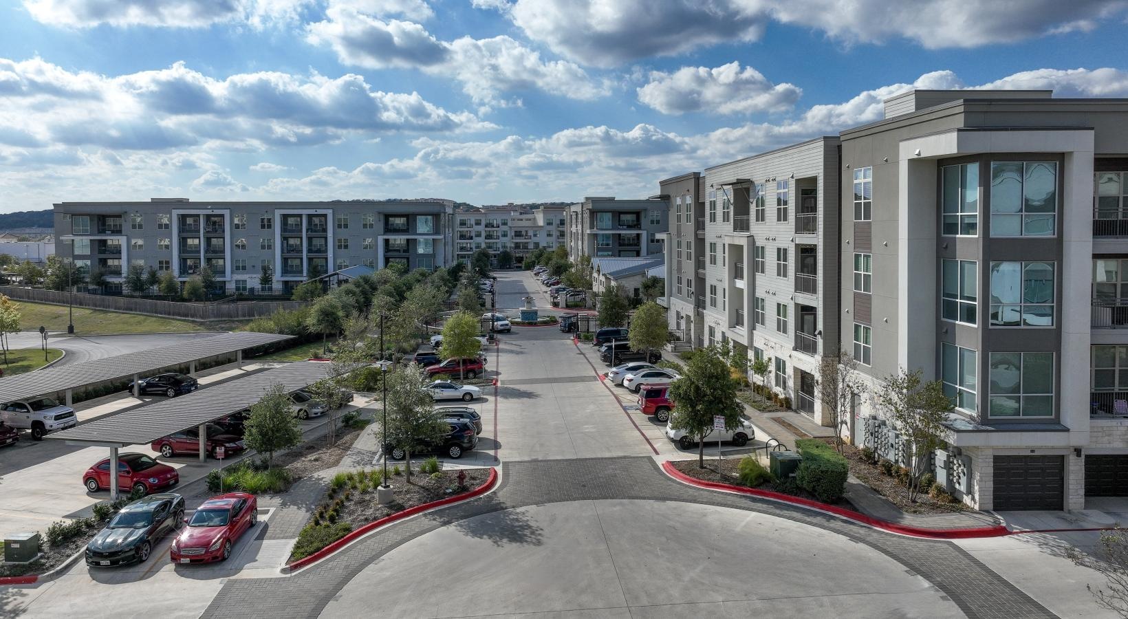 Settle into comfort at Berkshire at the Rim a street with cars and buildings