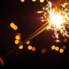 a person holding a sparkler