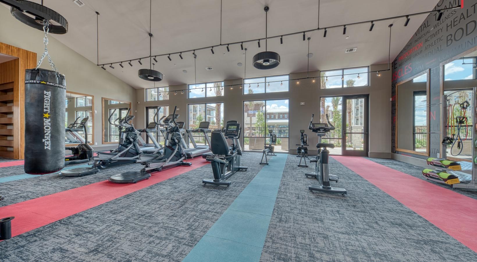 Quick access to state-of-the-art amenities a gym with exercise equipment