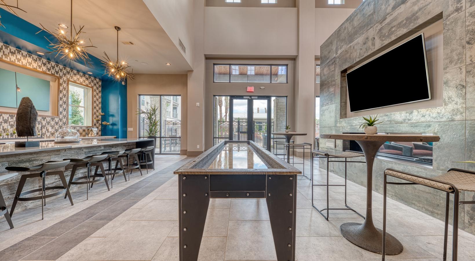 Access to resident-only features a room with tables and chairs